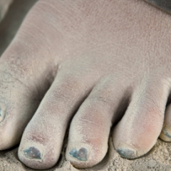 Manicured toes in the dust