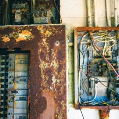 Rusty boxes with wires in Marin Headlands