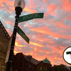 Sunset at the corner of Boylston St and Dartmouth St.