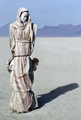 Burning Man 1996 photograph. I loved this art, it was all alone in a vast area of playa. It reminds me of marble sculpture.