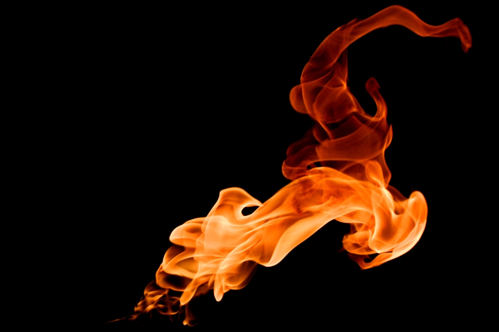 Burning Man 2004 photograph. See <a href='/photos/fire/flames/fire-molar/'>the complete fire collection here.</a>