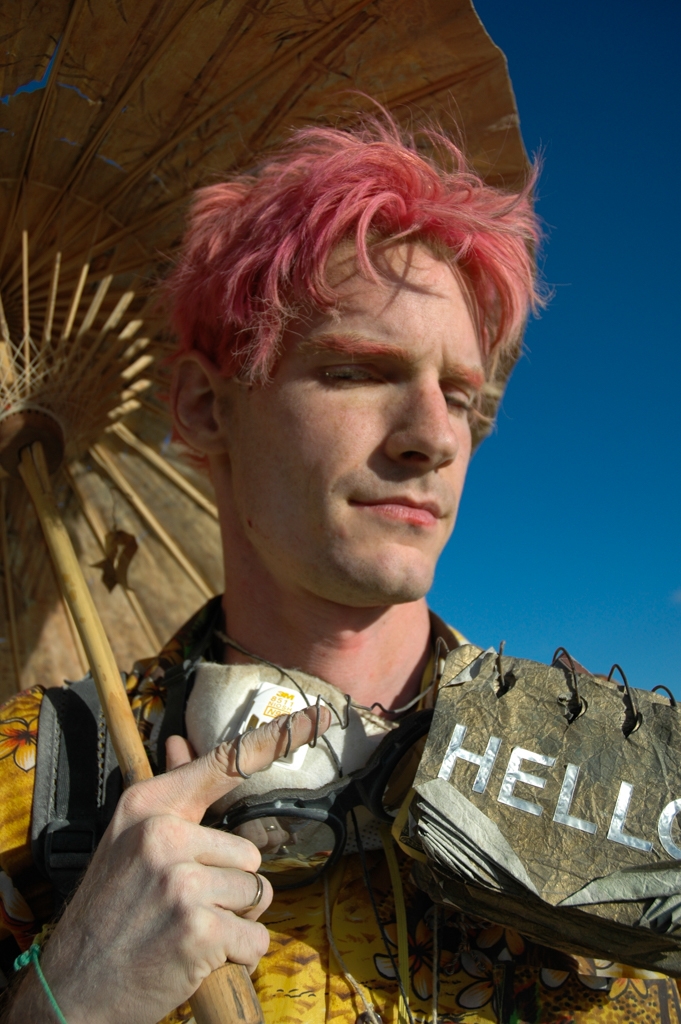 Burning Man 2004 photograph. He had a book that could speak sentences, one word at a time. He had conversations that way.