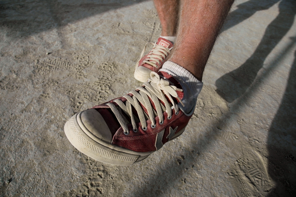 Feet and Shoes photograph. Old fashioned sneakers. Circa 70's or so?