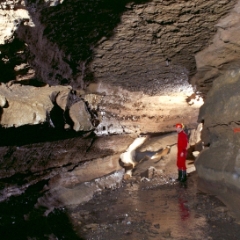 Main Tunnel, caver in red suit