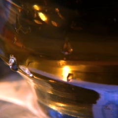 Closeup of apple juice with a water droplet