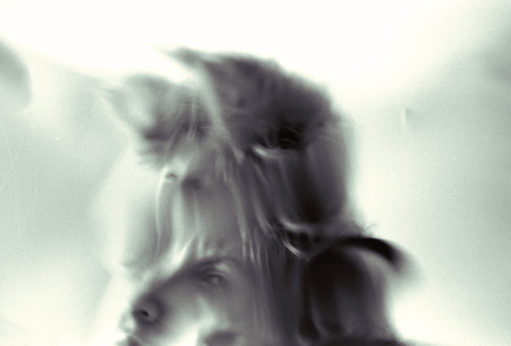 Distorted portraits photograph. 